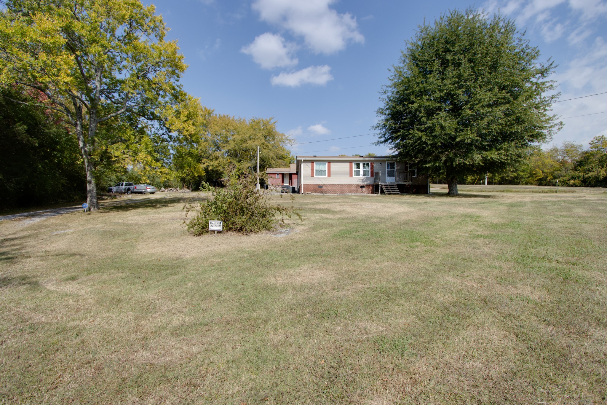 745 Holloway Road Lebanon, TN 37090 - Photo 30 of 30 a house with trees in front of it