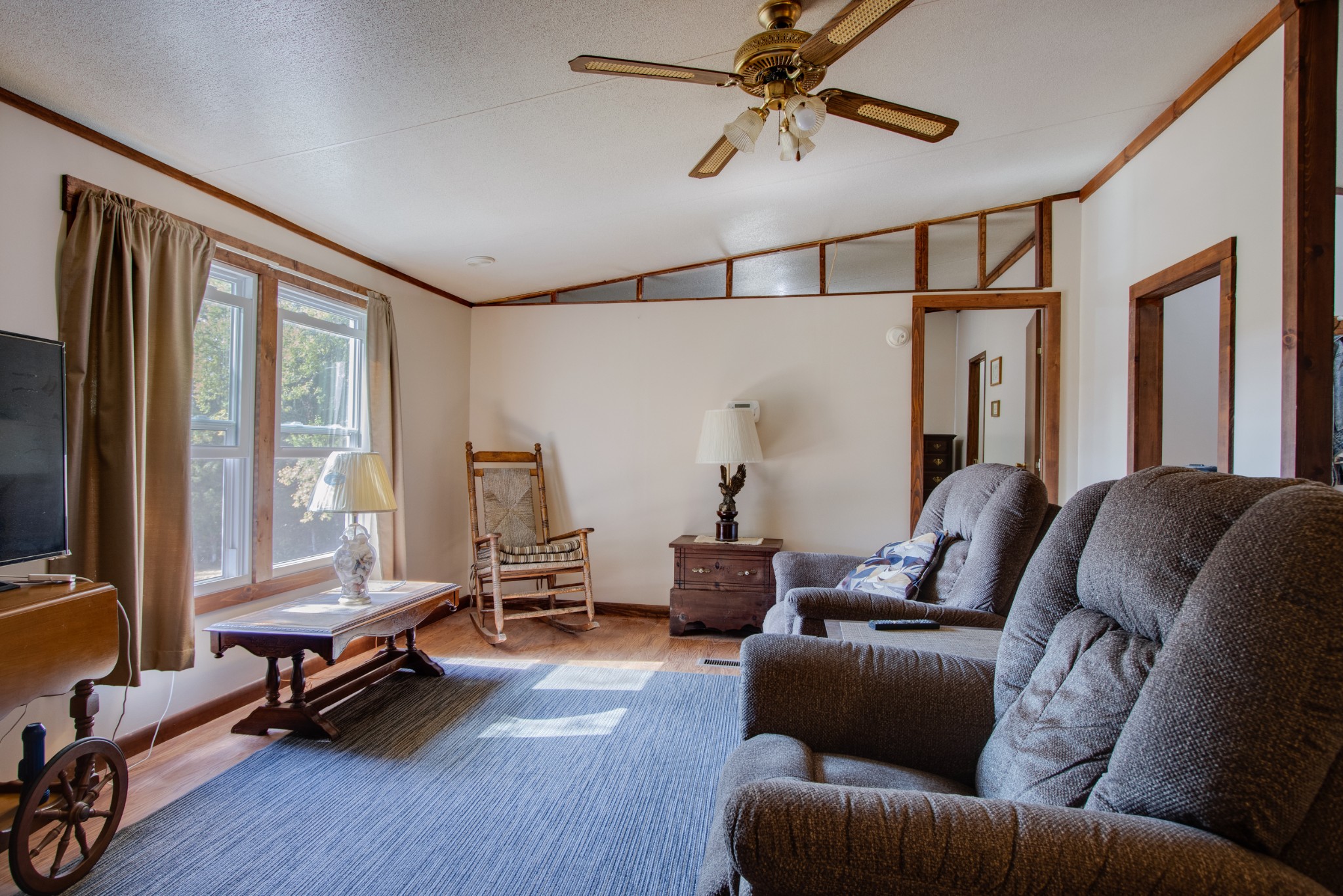 745 Holloway Road Lebanon, TN 37090 - Photo 4 of 30 a living room with furniture gym equipment and a large window