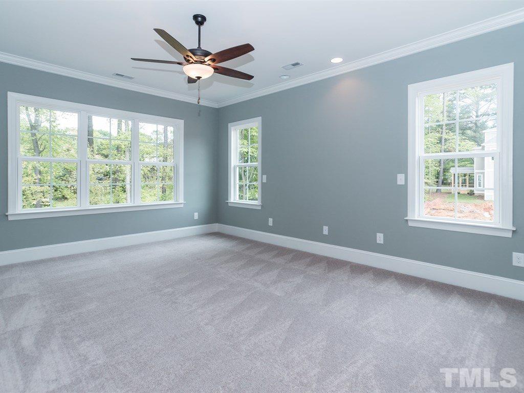 6402 Rosny Road Raleigh, NC 27613 - Photo 14 of 25 a view of an empty room with a window