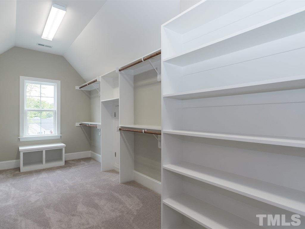 6402 Rosny Road Raleigh, NC 27613 - Photo 18 of 25 a view of an empty room with a window