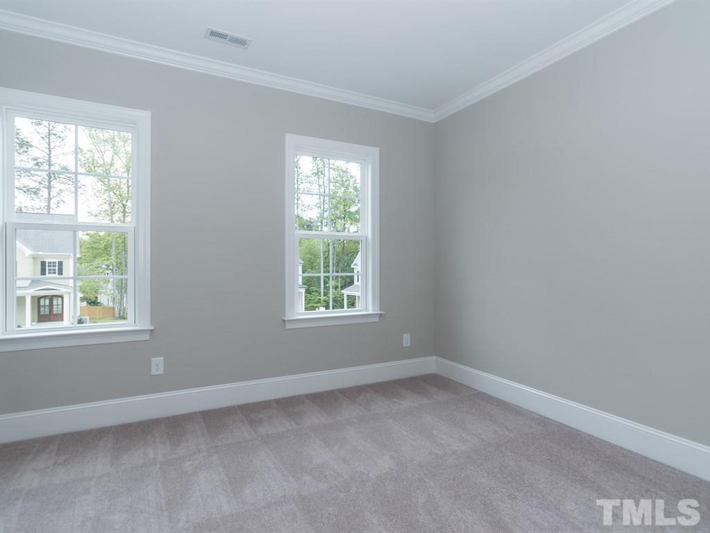 6402 Rosny Road Raleigh, NC 27613 - Photo 19 of 25 an empty room with a window