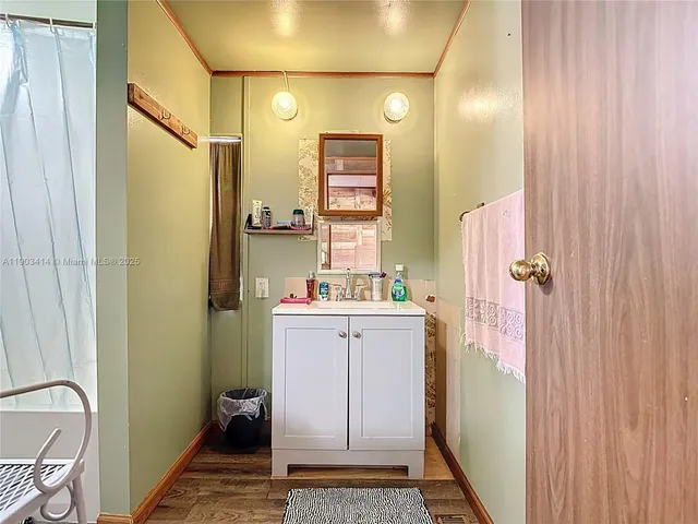 a balcony with wooden floor