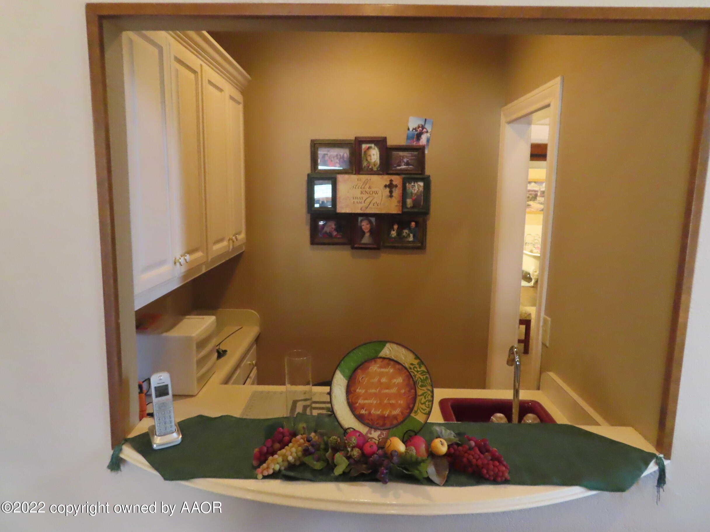6 Monet Rue Amarillo, TX 79121 - Photo 1 of 13 a room with a wooden floor and a sink