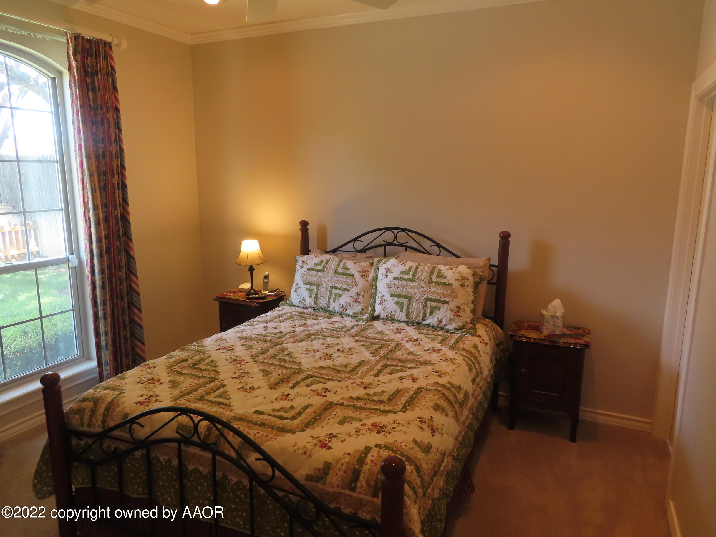 6 Monet Rue Amarillo, TX 79121 - Photo 10 of 13 a bedroom with a bed and a window