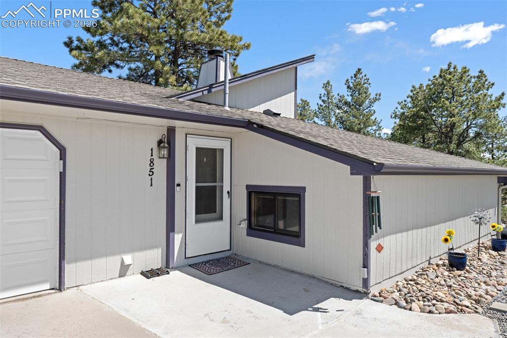 1851 Buttercup Road Elizabeth, CO 80107 - Photo 3 of 47 a house view with a outdoor space