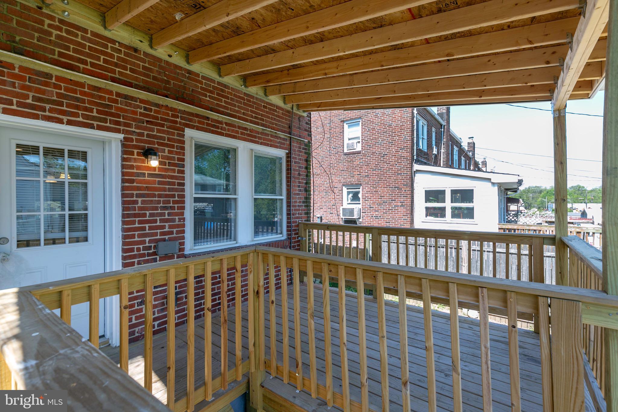 168 West Meadow Road Baltimore, MD 21225 - Photo 15 of 44 Covered Deck for multi season enjoyment