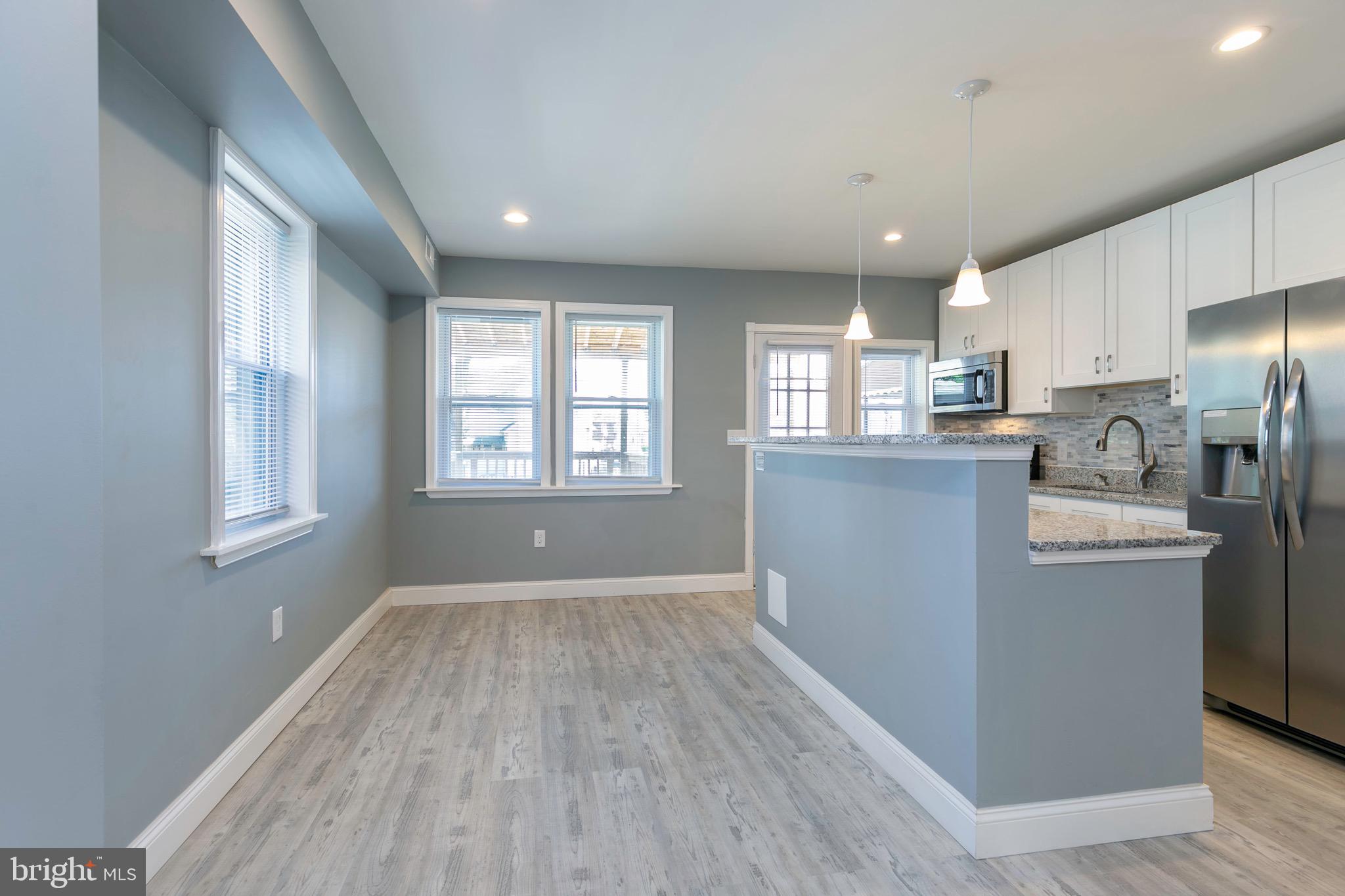 168 West Meadow Road Baltimore, MD 21225 - Photo 25 of 44 View of Dining Room and Kitchen.