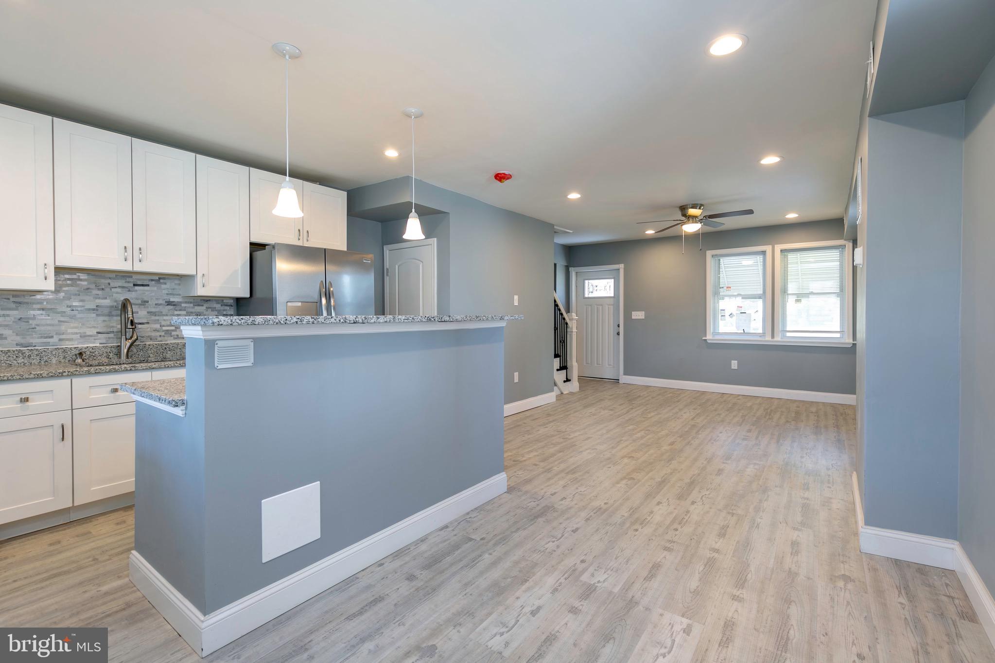 168 West Meadow Road Baltimore, MD 21225 - Photo 26 of 44 Kitchen Island with Breakfast Bar.