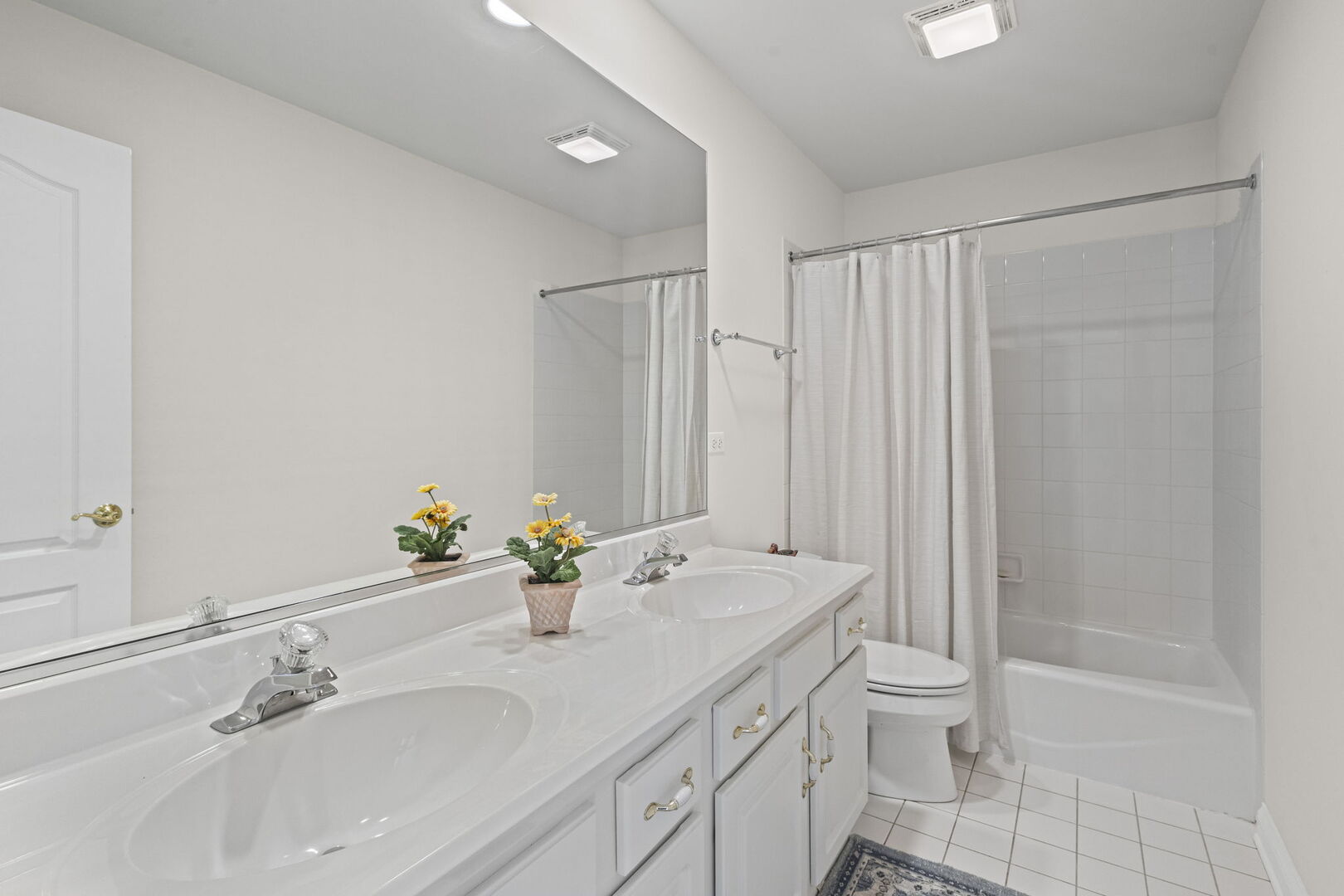 21787 Vernon Ridge Drive Mundelein, IL 60060 - Photo 22 of 38 a bathroom with a bathtub shower sink vanity and toilet