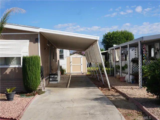 a house with a plant in front of it