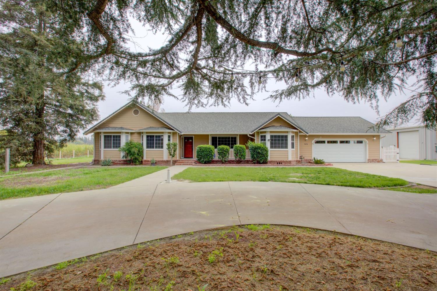 1624 Golf Road Turlock, CA 95380 - Photo 1 of 1 a view of house with street