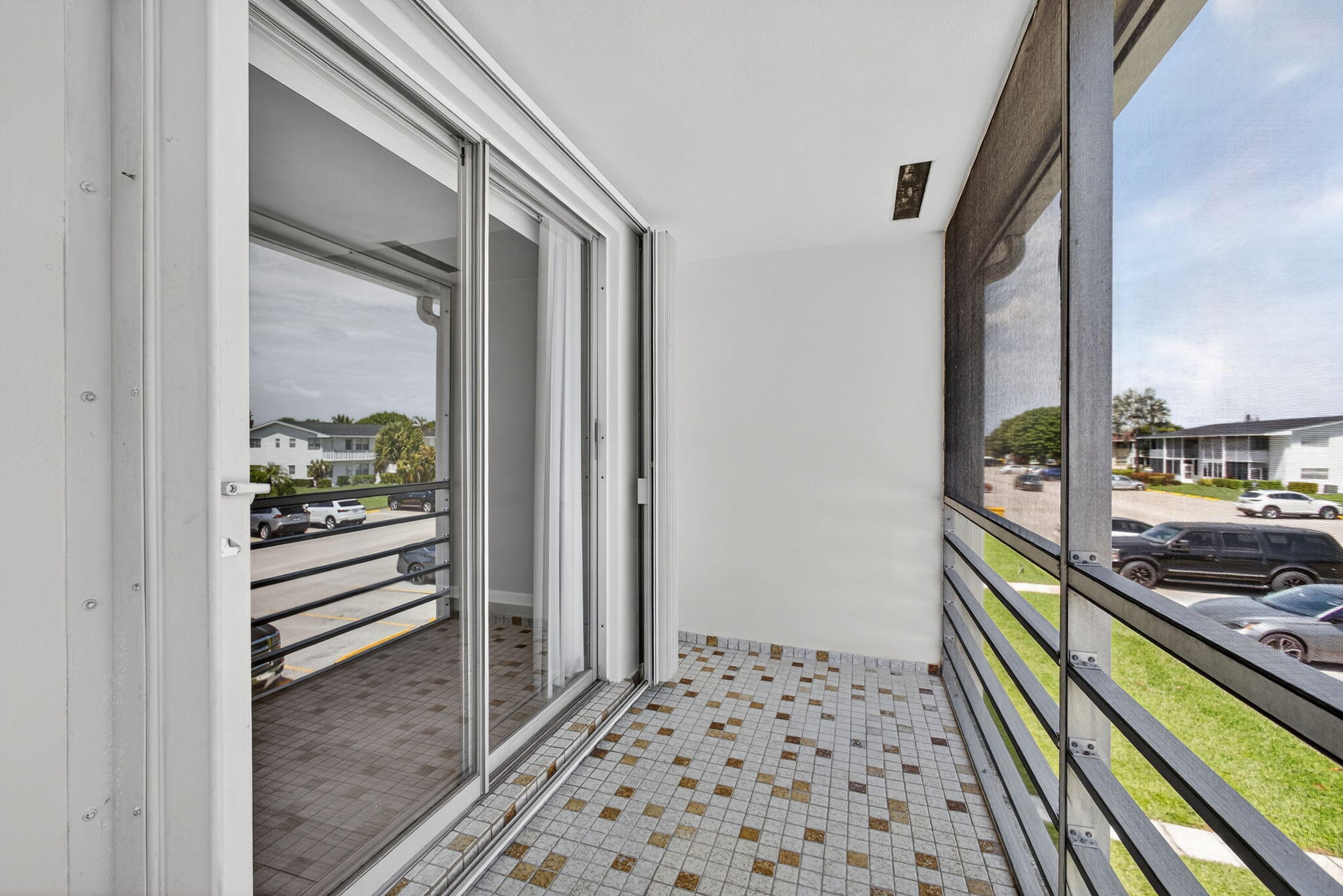 42 Easthampton B West Palm Beach, FL 33417 - Photo 19 of 37 a view of a balcony from a window