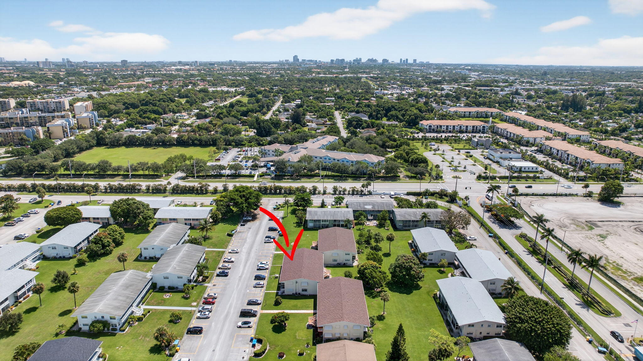42 Easthampton B West Palm Beach, FL 33417 - Photo 31 of 37 an aerial view of residential houses with outdoor space