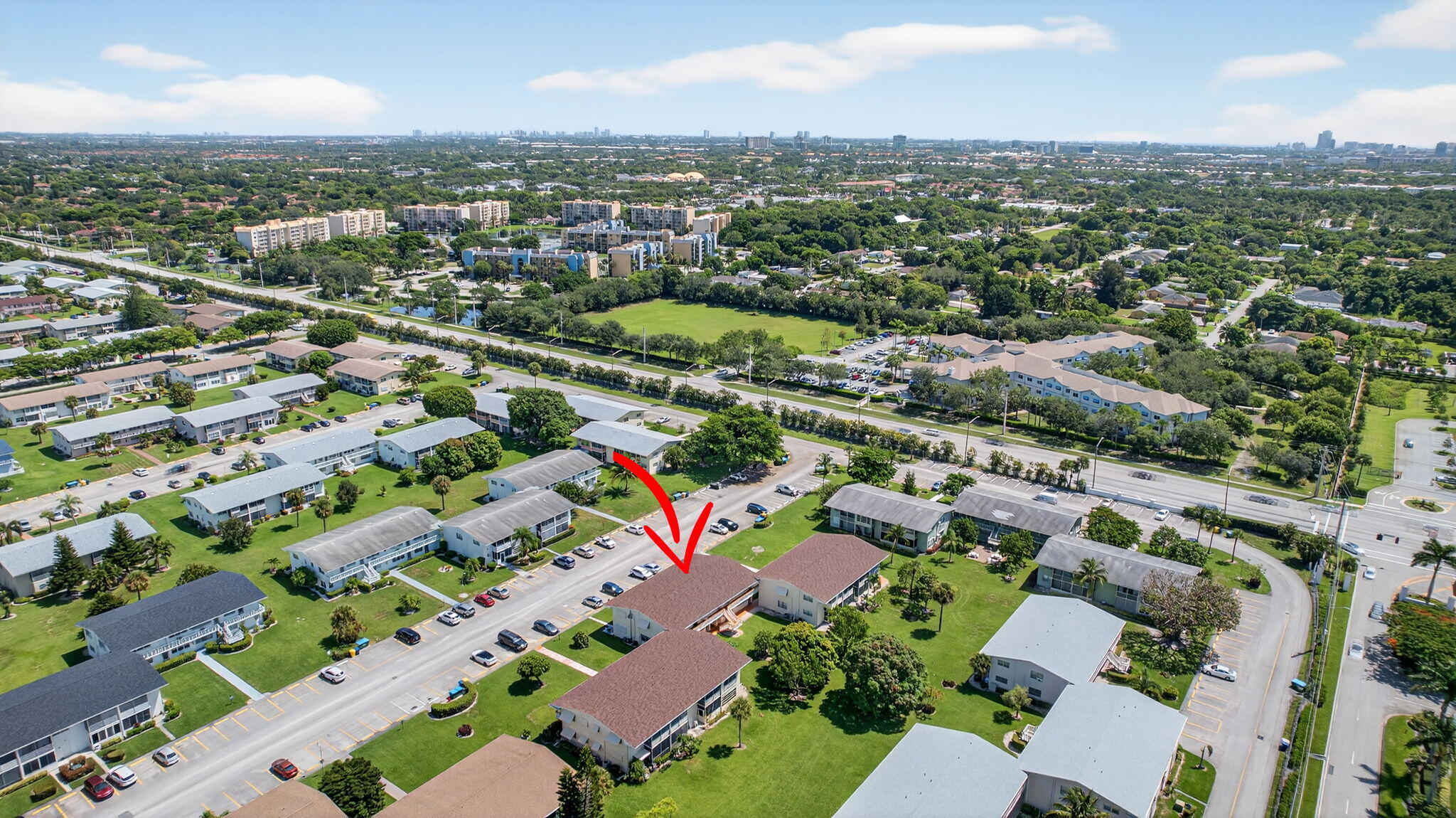 42 Easthampton B West Palm Beach, FL 33417 - Photo 32 of 37 an aerial view of a city with lots of residential buildings