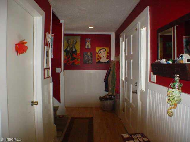1674 Hauser Road Lewisville, NC 27023 - Photo 5 of 9 Other. Nice big foyer...washer and dryer just off the foyer...convenient to all the bedrooms.