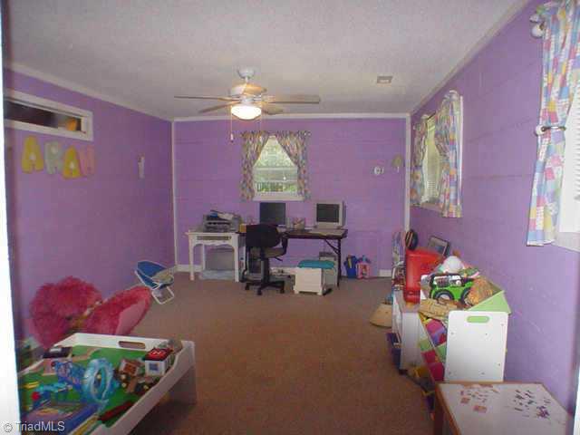 1674 Hauser Road Lewisville, NC 27023 - Photo 7 of 9 Other. Bonus room. Perfect for the kids playroom or for an office.