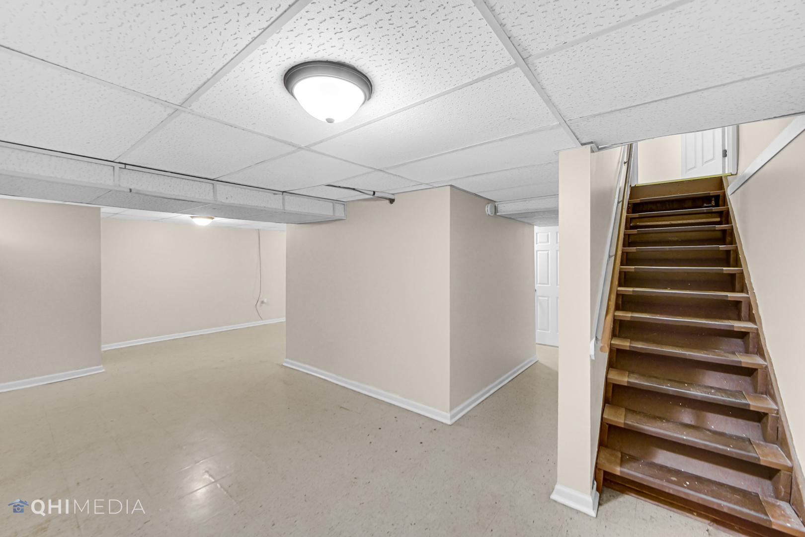 658 Eastview Drive Kankakee, IL 60901 - Photo 13 of 17 a view of an empty room with stairs
