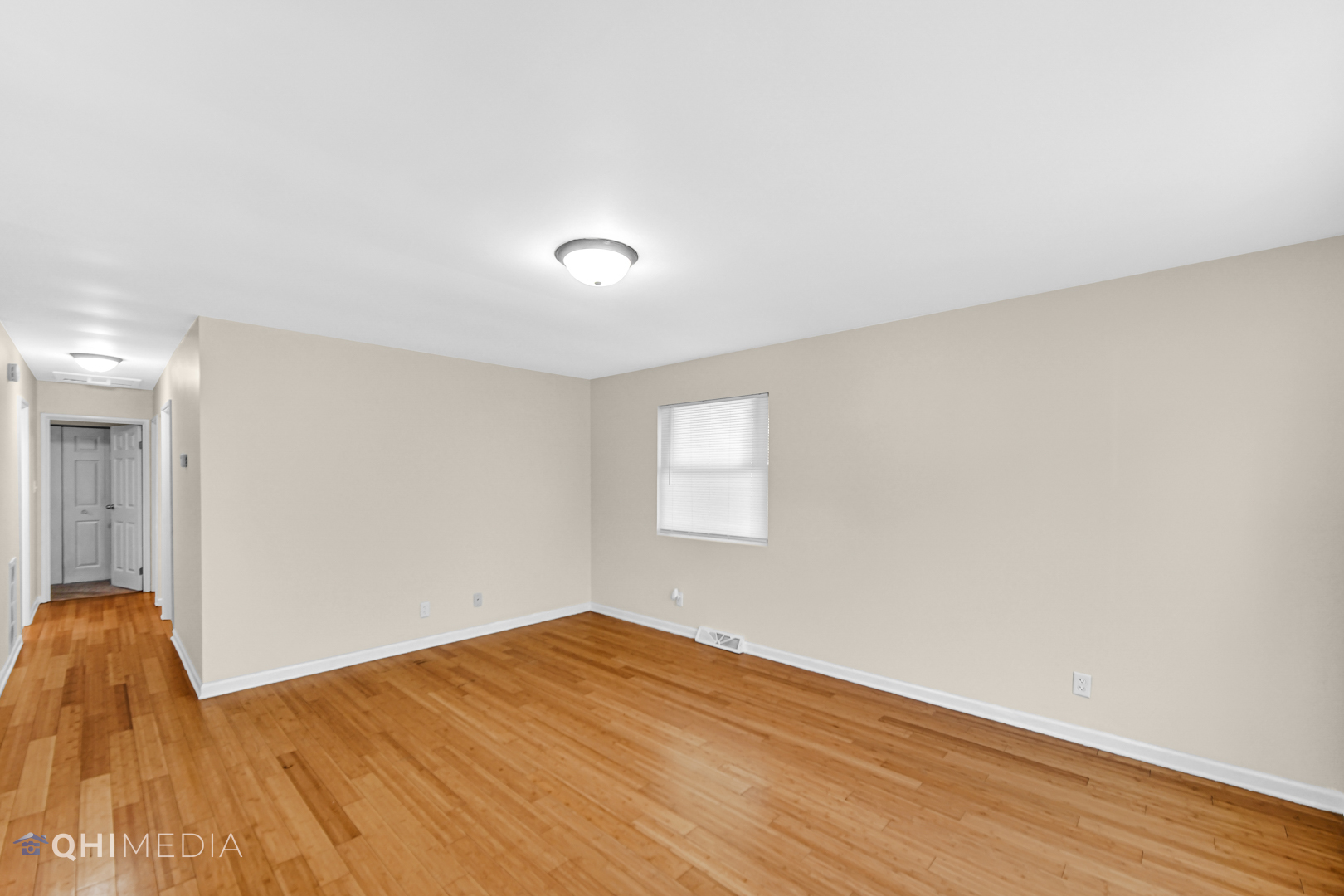 658 Eastview Drive Kankakee, IL 60901 - Photo 3 of 17 a view of empty room with wooden floor