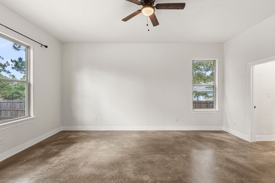 203 Cardinal Loop Paige, TX 78659 - Photo 13 of 36 an empty room with a window