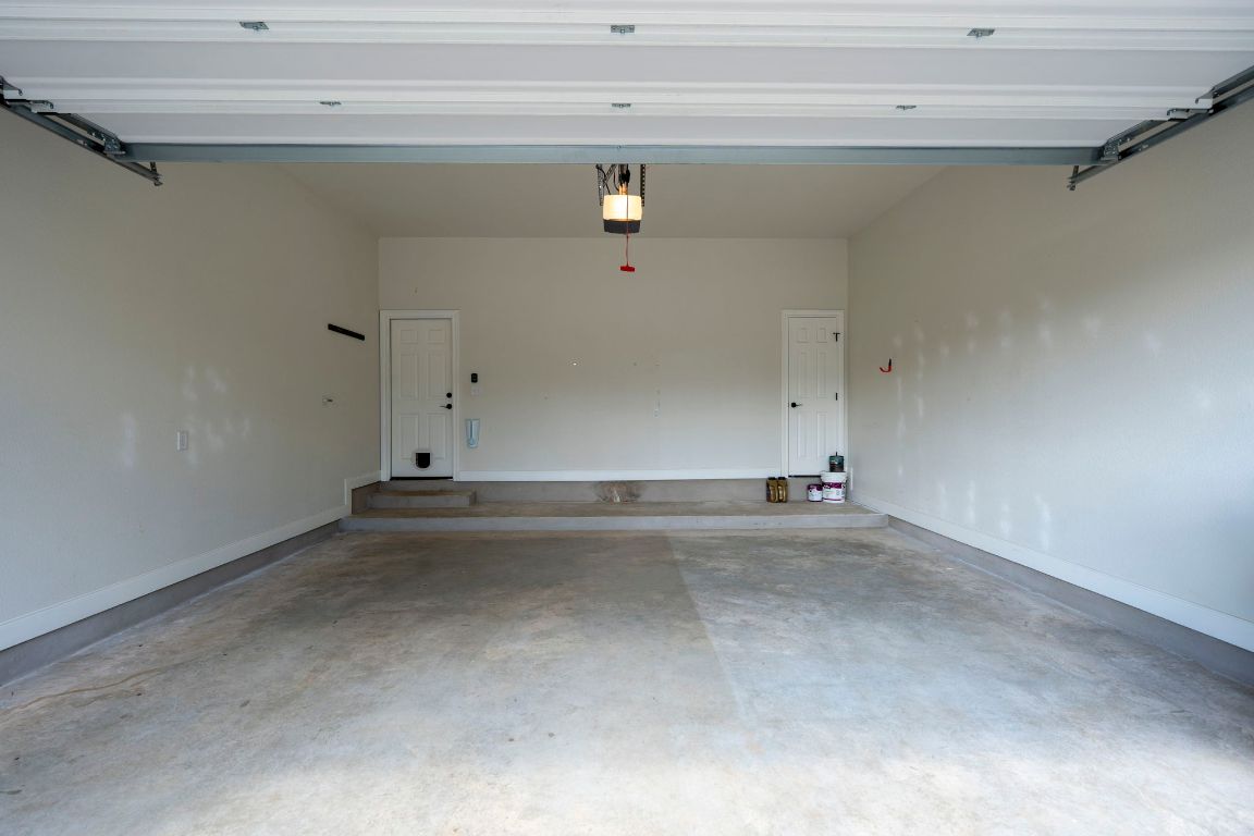 203 Cardinal Loop Paige, TX 78659 - Photo 34 of 36 a view of a garage