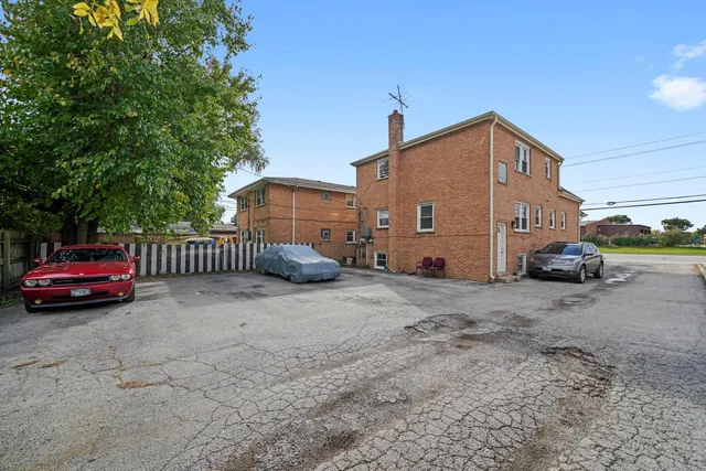 a view of street with parked cars