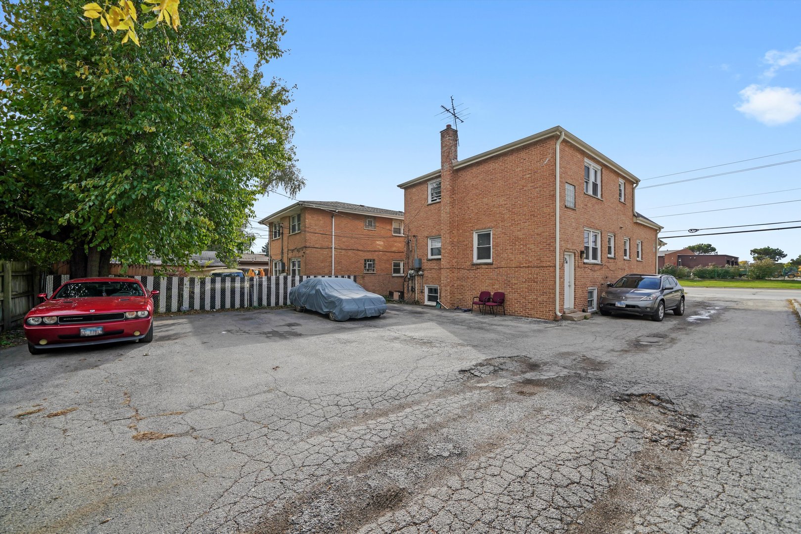 7549 Roberts Road Bridgeview, IL 60455 - Photo 13 of 19 a view of street with parked cars
