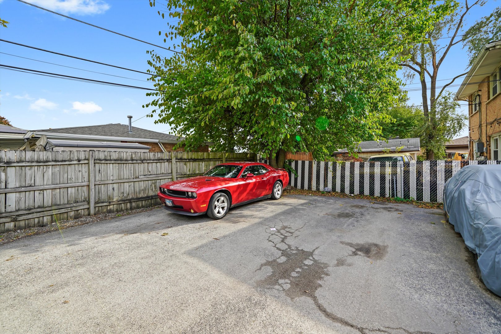 7549 Roberts Road Bridgeview, IL 60455 - Photo 14 of 19 a view of a house with a cars park side of a road