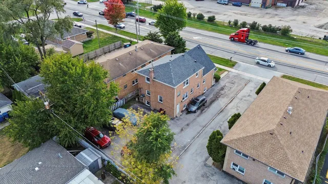 an aerial view of a house with a garden