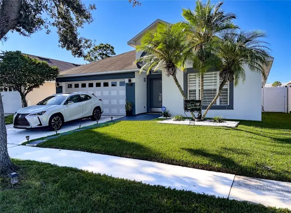 a house view with a garden space