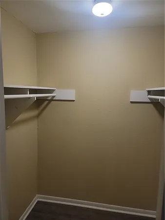 a view of a room with racks on the wall