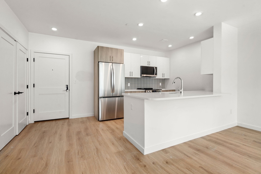 40 Centre Street, Unit 302 Brookline, MA 02446 - Photo 1 of 7