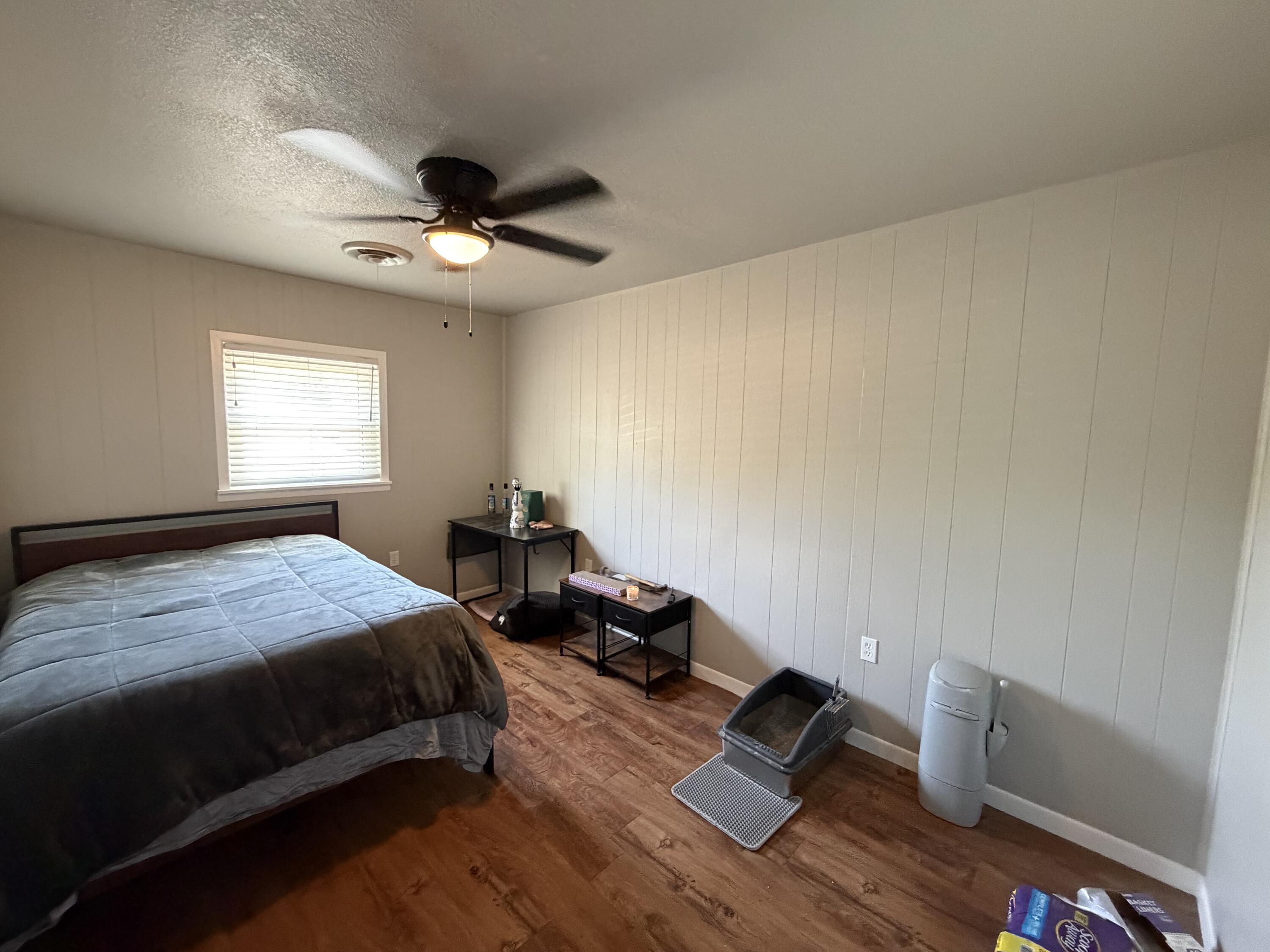 2202 58th Street Lubbock, TX 79412 - Photo 13 of 37 a bedroom with bed and window