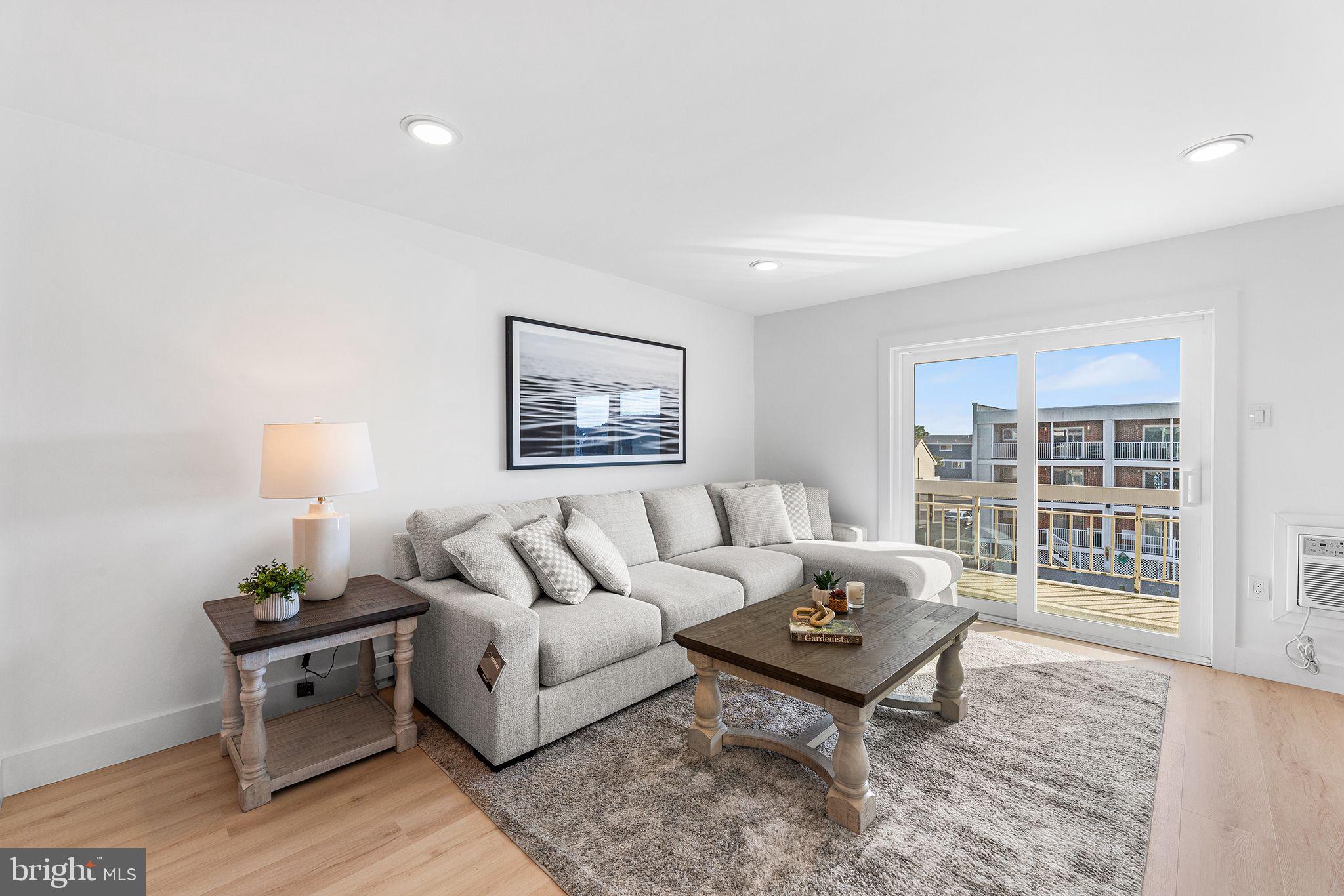 615 Salt Spray Road, Unit 3E Ocean City, MD 21842 - Photo 26 of 39 Living Room closer look at balcony/slider