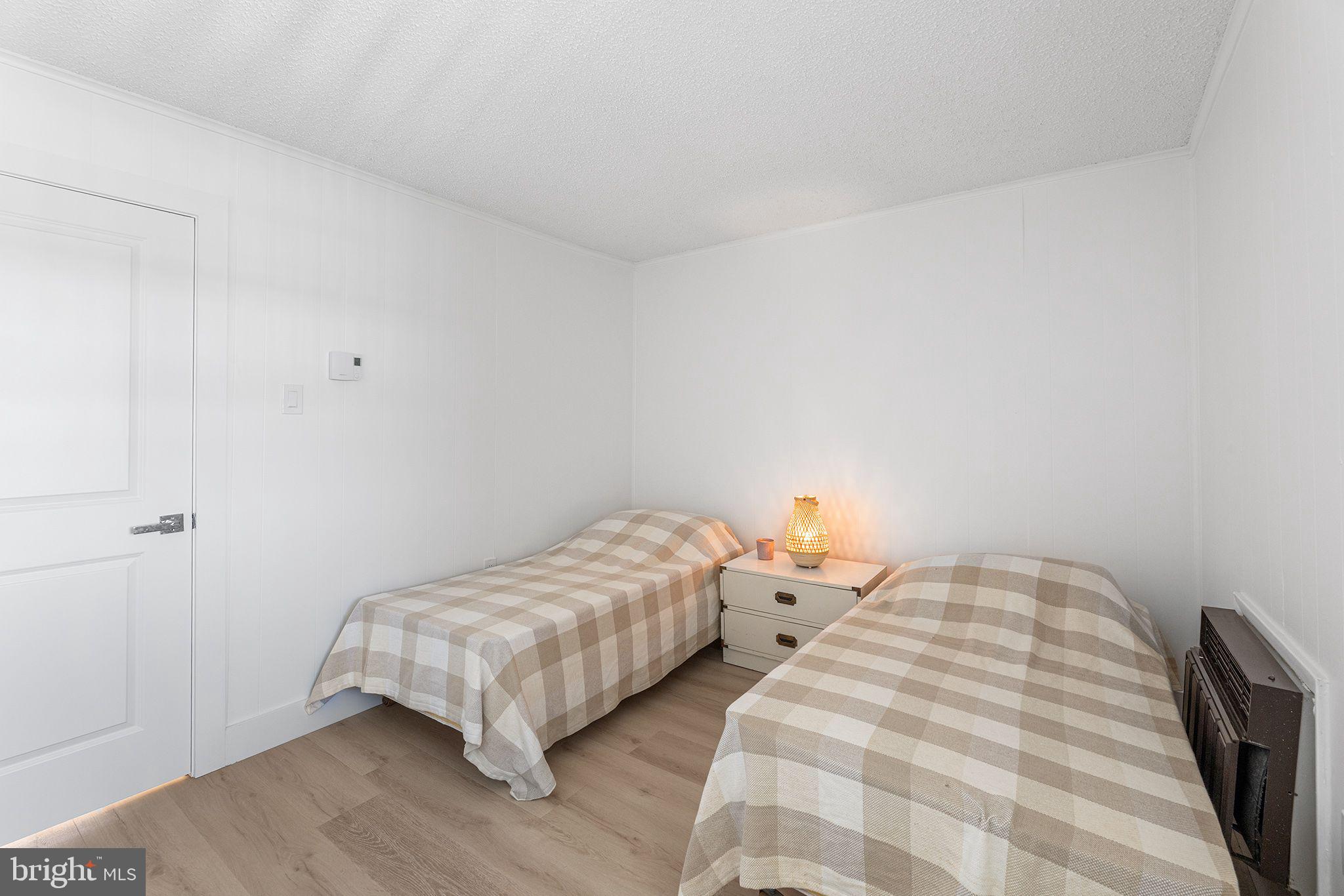 615 Salt Spray Road, Unit 3E Ocean City, MD 21842 - Photo 35 of 39 Bedroom 2