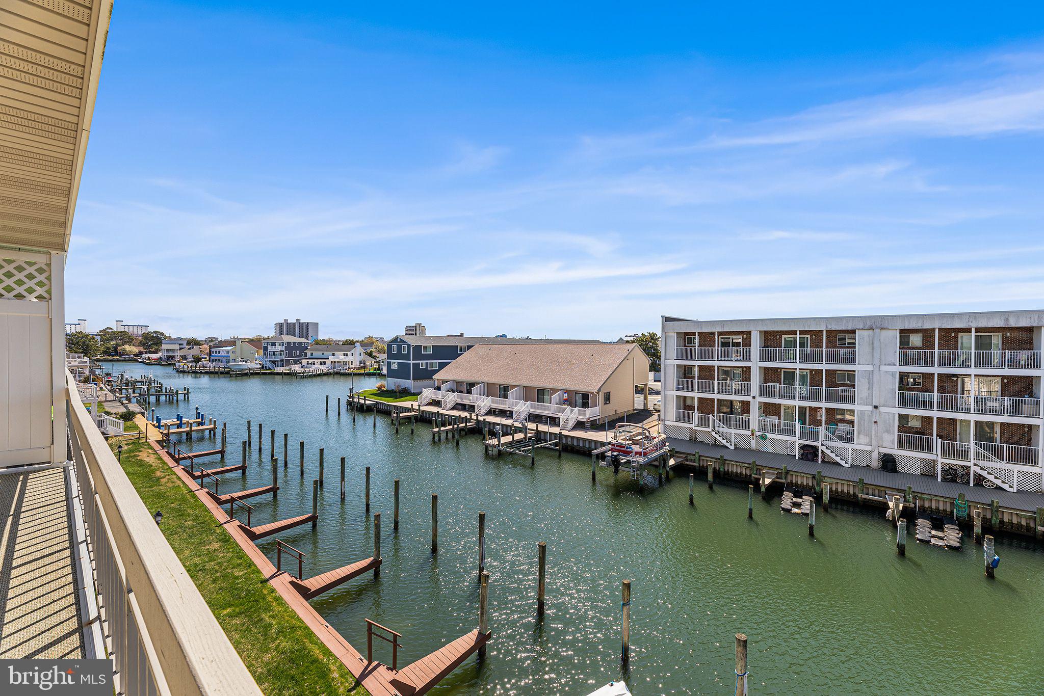 615 Salt Spray Road, Unit 3E Ocean City, MD 21842 - Photo 10 of 39 reverse view of the canal/boatslips