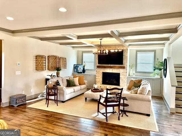 a living room with furniture and a table