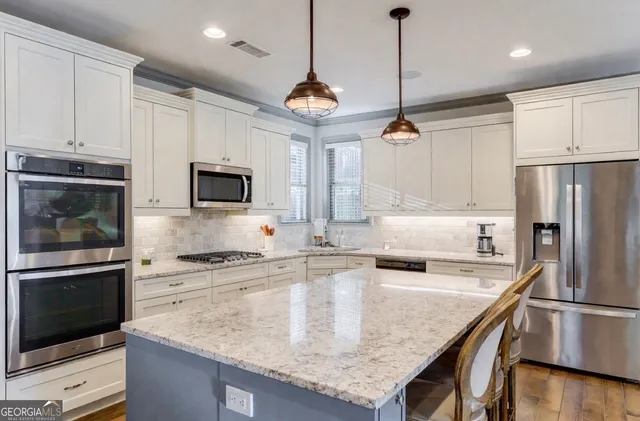 a bathroom with a sink and a window