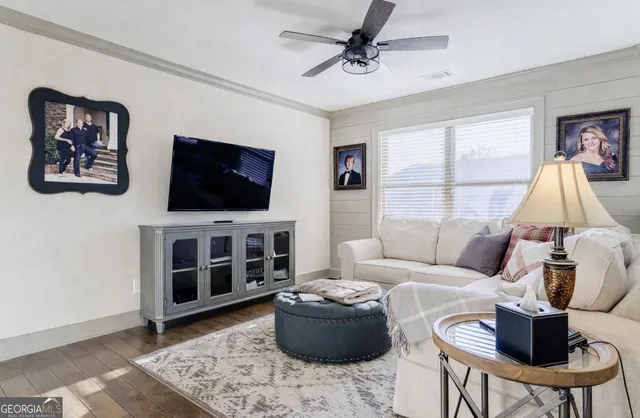 a spacious bathroom with a granite countertop sink mirror and
