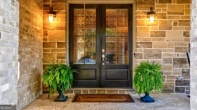 a living room with fireplace furniture and a wooden floor