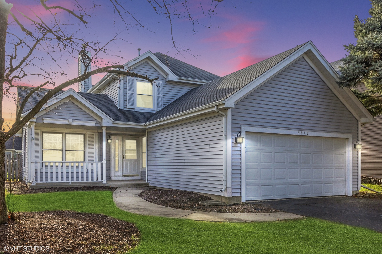 4418 Riverside Drive Plainfield, IL 60586 - Photo 21 of 21 a view of a house with a small yard and large tree