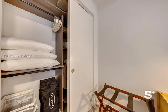 a view of staircase with white walls and stairs