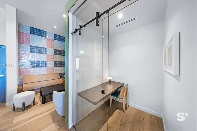 a room with furniture and a window