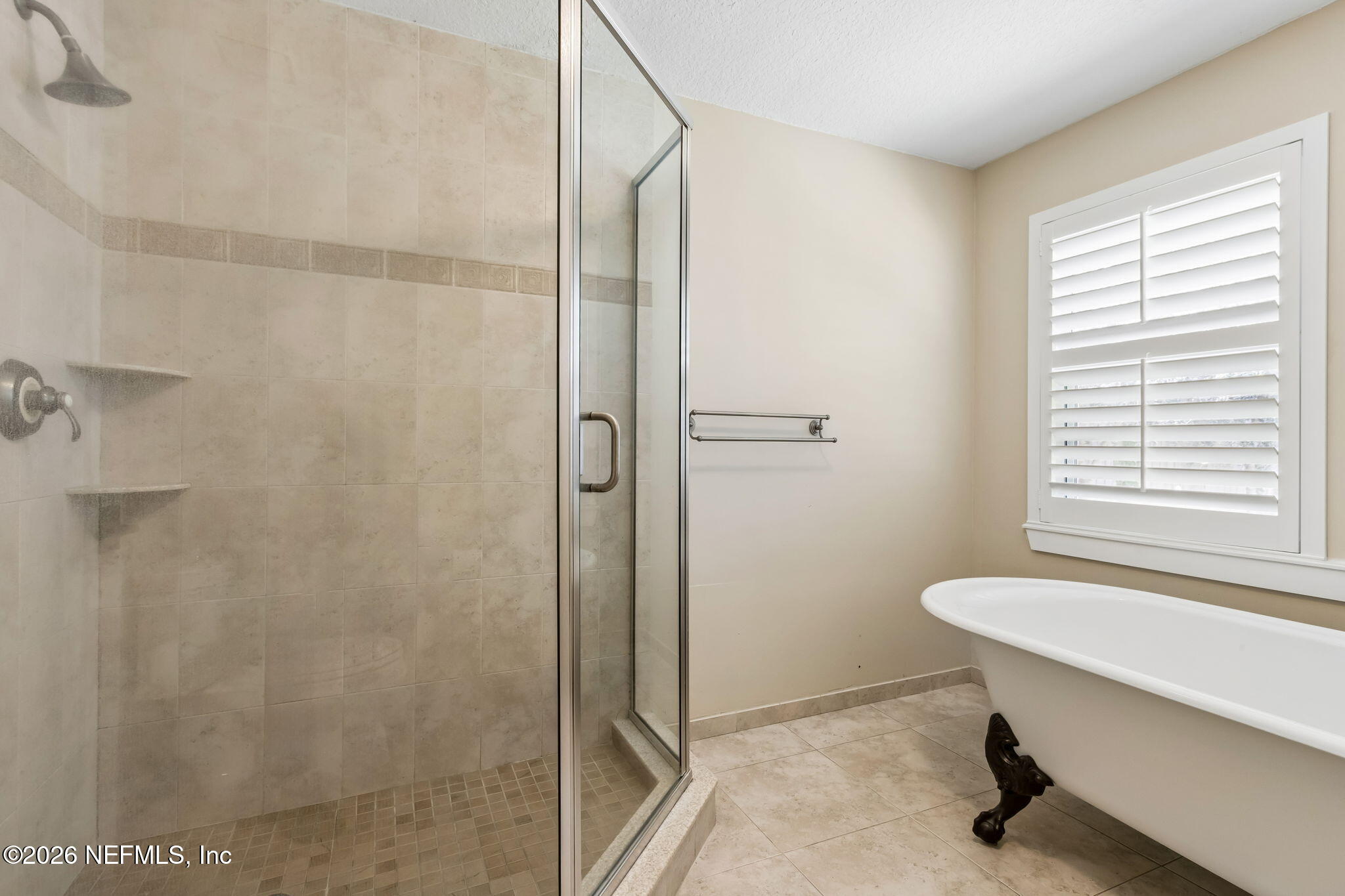 1877 Christopher Point Road South Jacksonville, FL 32217 - Photo 10 of 27 a bathroom with a shower