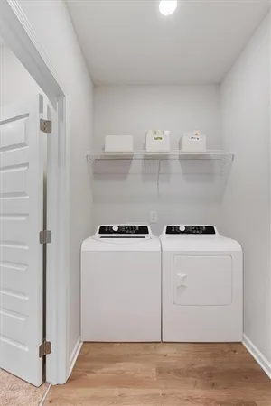 a kitchen with a stove and a refrigerator