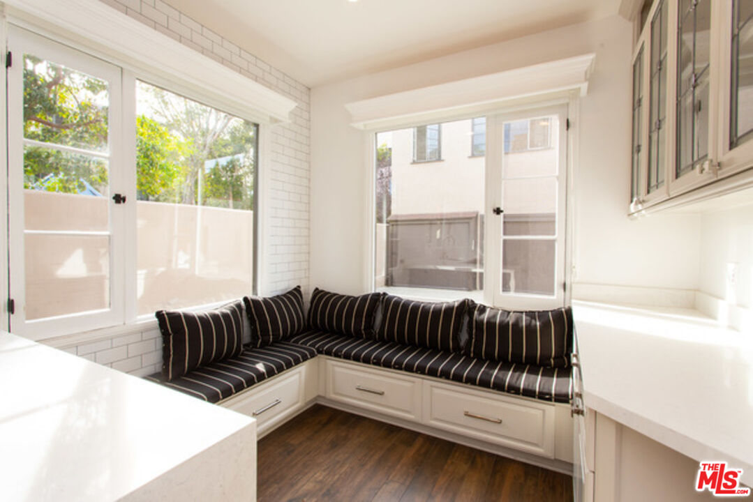 153 North Arnaz Drive Beverly Hills, CA 90211 - Photo 11 of 20 a living room with furniture and a window