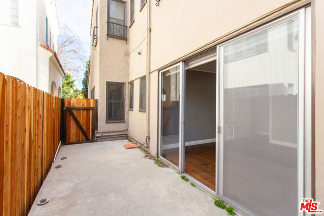 153 North Arnaz Drive Beverly Hills, CA 90211 - Photo 19 of 20 a view of a back yard