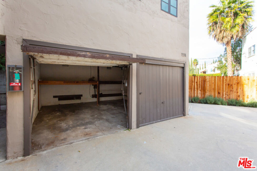 153 North Arnaz Drive Beverly Hills, CA 90211 - Photo 20 of 20 a view of a room with wooden walls