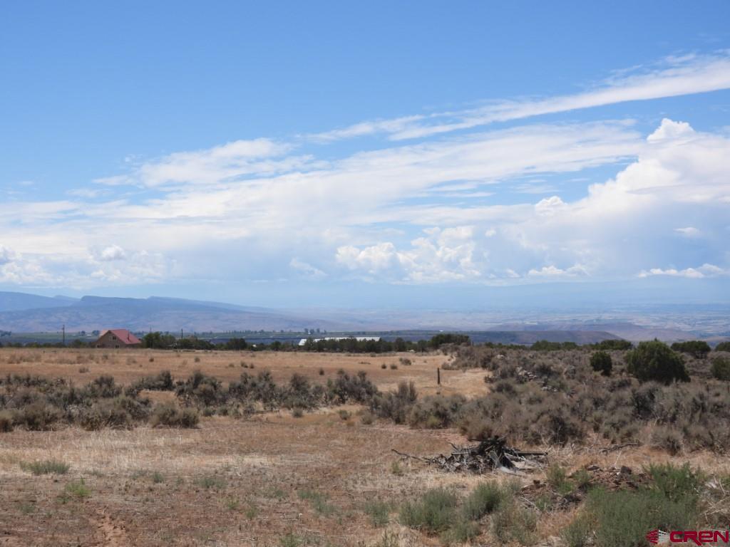 24754 Cedar Mesa Road Cedaredge, CO 81413 - Photo 1 of 3 an aerial view of multiple house