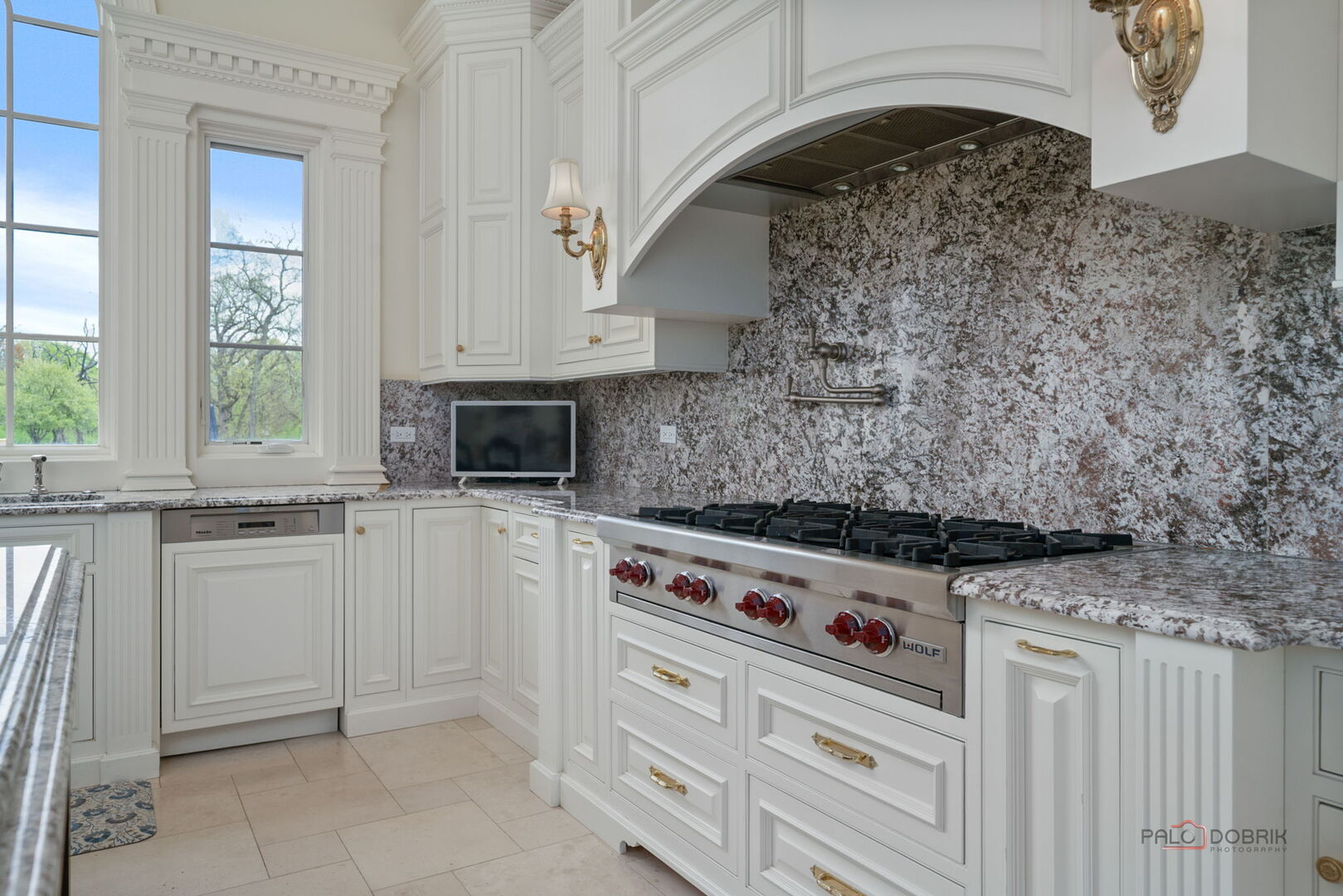 93 Hawley Woods Road Barrington, IL 60010 - Photo 23 of 91 a kitchen with stainless steel appliances granite countertop a stove a sink and a microwave