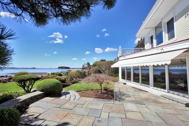 14 Sandpiper Road Westport, CT 06880 - Photo 1 of 1 a view of a house with a yard and potted plants